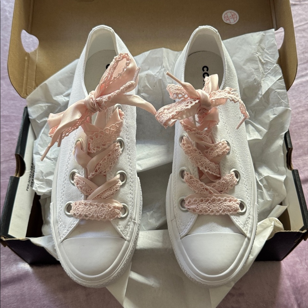 Converse White Sneakers with Pink Lace Details